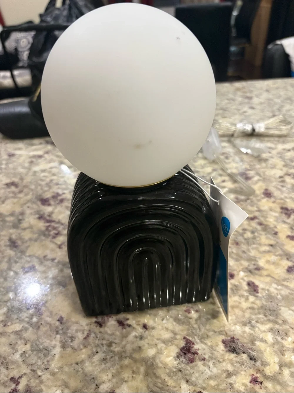 Contemporary White Globe Table Lamp with Black Glass Arch Base
